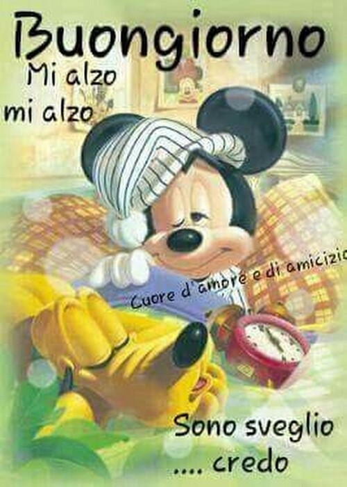 "Mi alzo, mi alzo... Sono sveglio credo... Buongiorno" - immagini con Topolino